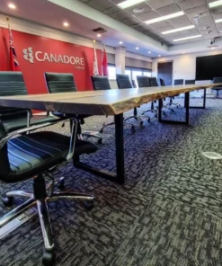 U-shaped steel leg base on maple boardroom table