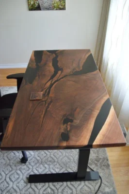 Executive epoxy river boardroom table with custom steel legs