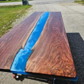 nicely grained black walnut slabs epoxy rivers table