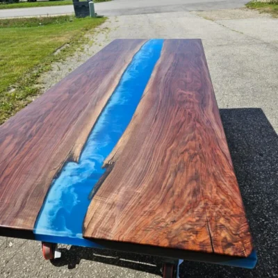 nicely grained black walnut slabs epoxy rivers table